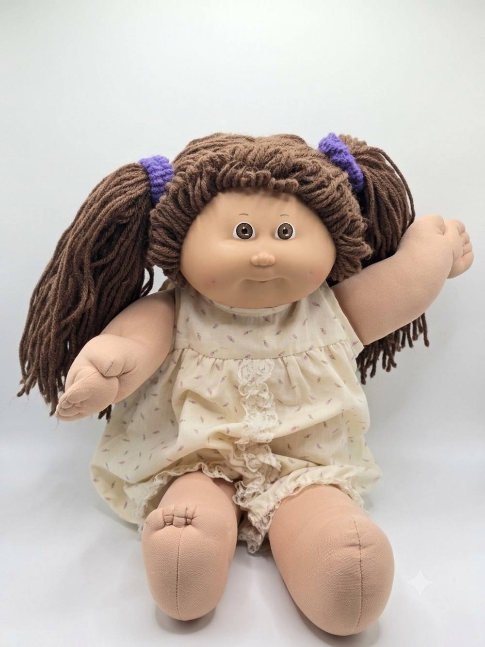 Vintage Cabbage Patch Kids Doll with Brown Pigtails & Floral Romper